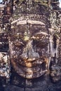 Stone head on towers of Bayon temple in Angkor Thom, Siem Reap, Royalty Free Stock Photo