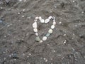 Stone heart made of small stones. Royalty Free Stock Photo