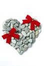 Stone Heart with Red Bows Royalty Free Stock Photo