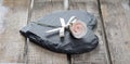 Stone heart on wooden background