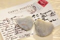 Stone hearts with postcard