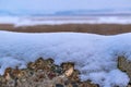 Stone hedge covered with snow against the blue sky Royalty Free Stock Photo