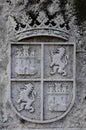 Stone heraldic coat of arms on a wall in Cuellar, Segovia.