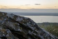 A stone on a high mountain. Sunset