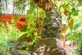 Stone hindu god Ganesha statue in asian hotel resort. Bali