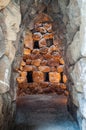 Stone historic buildings named Nuraghi on the island of Sardinia in Italy.