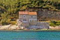 Stone house on beach in Susak Royalty Free Stock Photo