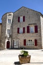 Stone house in the central square of the village of La Cavalerie, former commandery of the Templars