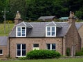 Stone house in the Forest of Glen Tanar Royalty Free Stock Photo