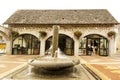 Stone house with fountain Saint-Mamet-la-Salvetat Royalty Free Stock Photo