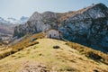 Stone house on a hill in the beautiful  National park of The Peaks of Europe in Spain Royalty Free Stock Photo