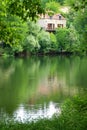 Stone house on Lot River, southern France Royalty Free Stock Photo