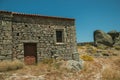 Stone house on rocky hilltop at the Castle of Monsanto Royalty Free Stock Photo