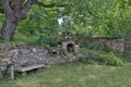 Stone house with stone fence in the Village of Leshten. Historical, facade. Royalty Free Stock Photo