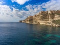 Stone houses of the old town of Bonifacio on the rocky shore of