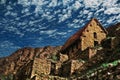 Stone houses and retaining walls in Machu Picchu Royalty Free Stock Photo