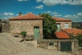 Stone houses with wooden door and deserted alley Royalty Free Stock Photo