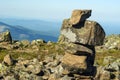 Stone idol on a mountain plateau