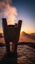 Stone incense burner at sunset Royalty Free Stock Photo