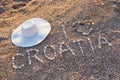 Stone inscription with hat on the pebbles