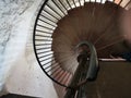 Stone and iron spiral stair case Royalty Free Stock Photo