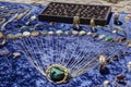 Stone jewelry sold on the street on blue velvet