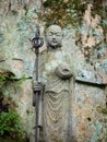 Stone Jizo statue in the mountains