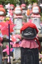 Stone Jizo statues, patrons of unborn children, at Zozo-ji Temple in Japan