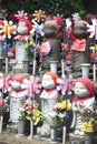 Stone Jizo statues, patrons of unborn children, at Zozo-ji Temple in Japan