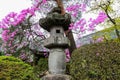 Stone lantern and beautiful pink flowers at Kita-in Temple,Kosenbamachi,Kawagoe,Saitama,Japan in spring.April9,2017