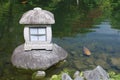 Stone Lantern and Fish Royalty Free Stock Photo