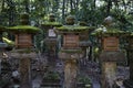 Stone lanterns covered with moss along the path that lead up to the Kasuga Taisha shrine