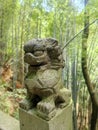 Close up of a lion stone statue in a park. Mythical creatures concept Royalty Free Stock Photo