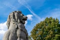A stone lion on the entrance to the walk way bridge at Antwerpen port Royalty Free Stock Photo