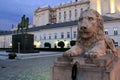 Stone Lion guarding Presidential Palace, view in the evening illumination, Warsaw, Poland Royalty Free Stock Photo