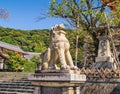 Stone lion sculpture near entrance to the ancient Kiyomizu-dera Buddhist temple in Kyoto, Japan Royalty Free Stock Photo