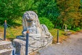 The stone lion sculpture in the park of Olesko Castle in Ukraine Royalty Free Stock Photo