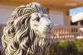 Stone lion statue. Marble Sculpture of a lion on pedestal Royalty Free Stock Photo