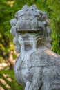Stone Lion Statue in Natural Setting Royalty Free Stock Photo