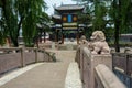 Stone lions on balustrades of ancient Chinese bridge Royalty Free Stock Photo