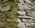 Stone masonry corner with rich and various texture