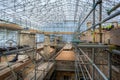 Stone Masons and roofers at work on major roof renovation of historic building at Dyrham Park, Gloucestershire, UK