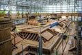 Stone Masons and roofesr at work on major roof repairs on historic country mansion in Dyrham Park, Gloucestershire, UK