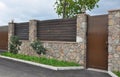 Stone and Metal Fence with Door of Modern Style Design Decorative Cracked Real Stone Wall
