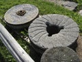 Stone millstones from an old water mill Royalty Free Stock Photo