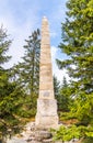 Stone monument of Adalbert Stifter - writer of Sumava Mounains - above Plechy Lake, Sumava National Park, Czech Republic
