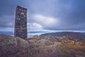 Stone monument on the summit of Mount Ulriken