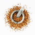 Stone mortar and pestle full of crushed red cayenne pepper, dried chili flakes and seeds isolated on a white background Royalty Free Stock Photo