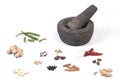 Stone mortar and pestle with herbs Royalty Free Stock Photo