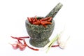 Stone mortar with red chillies Royalty Free Stock Photo